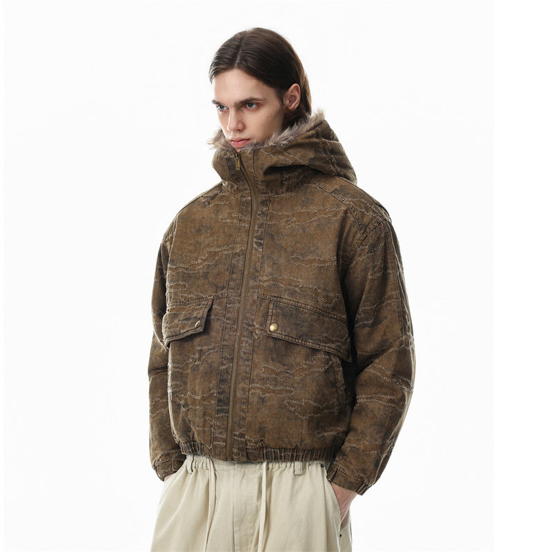Gewaschene Denim-Pufferjacke mit Kapuze und Kunstfellbesatz – Used-Camo-Stitching