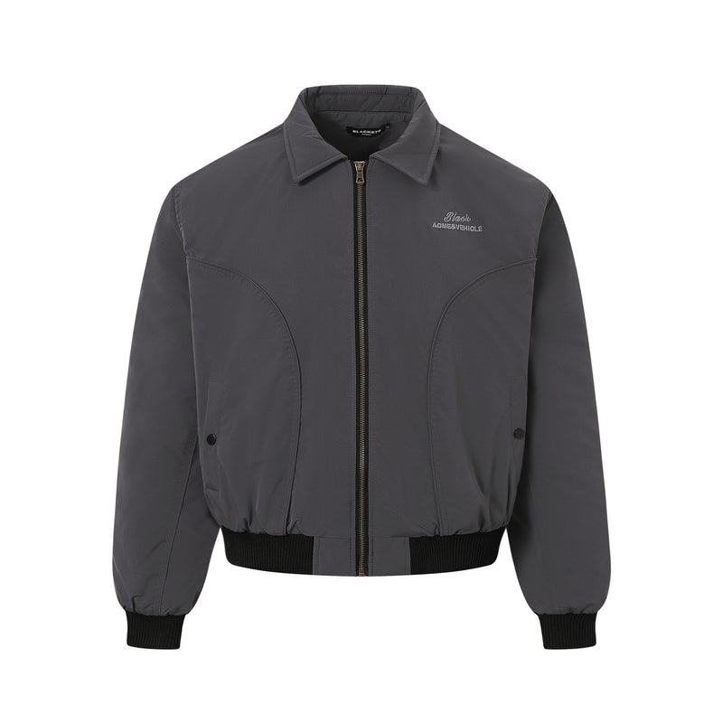 Veste bomber matelassée pour homme avec col à pointes et coutures arrondies