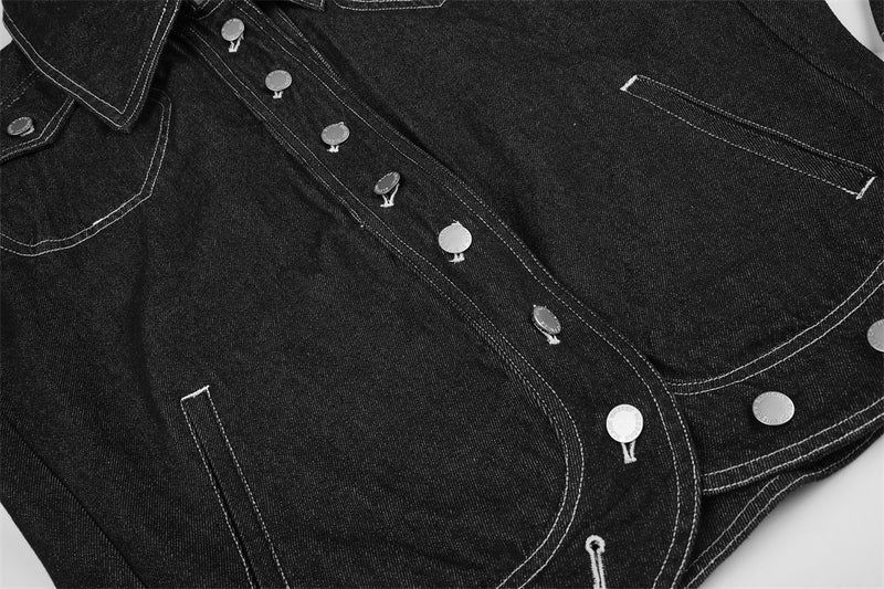 Front of black denim jacket laid flat, showing snap placket, pockets and contrast stitching