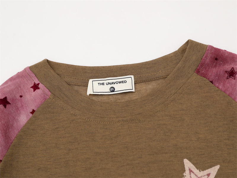 T-shirt homme raglan à manches longues avec manches imprimées d'étoiles et motif graphique sur le devant