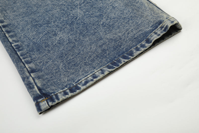 Jean baggy à jambes larges avec poches arrière graphiques – Coupe tonneau oversize