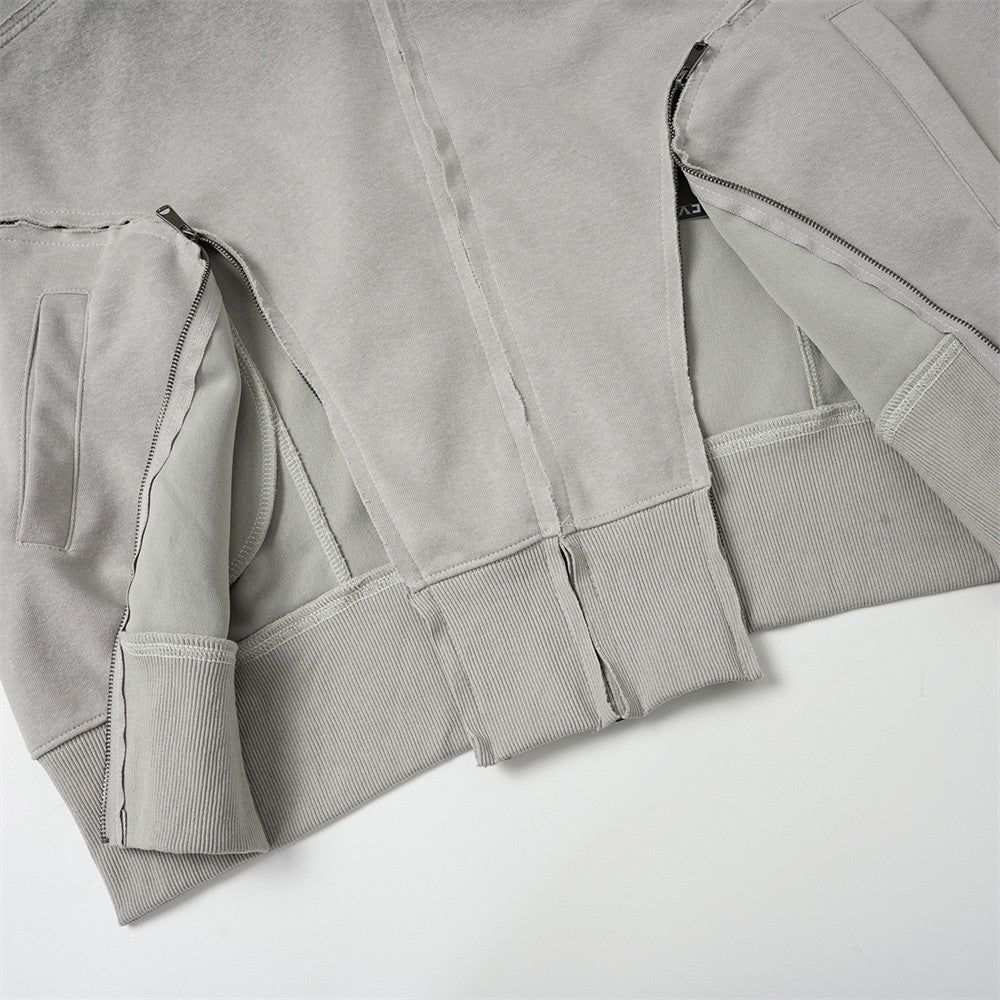 Sweat à capuche oversize zippé – Finition délavée usée, poches à multiples zips et bords bruts