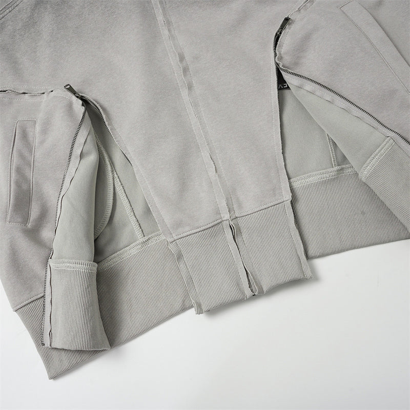 Sweat à capuche oversize zippé – Finition délavée usée, poches à multiples zips et bords bruts