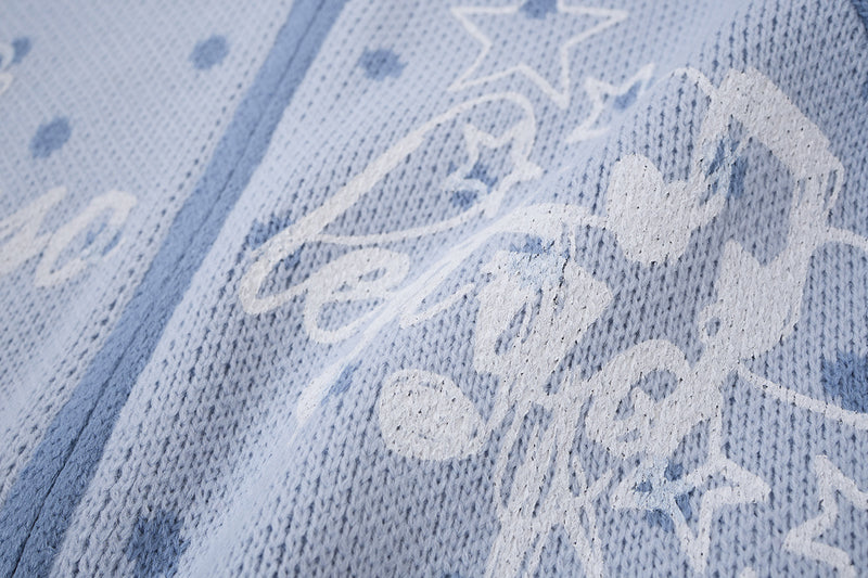 Cardigan en maille zippé à pois avec motif étoile et notes de musique