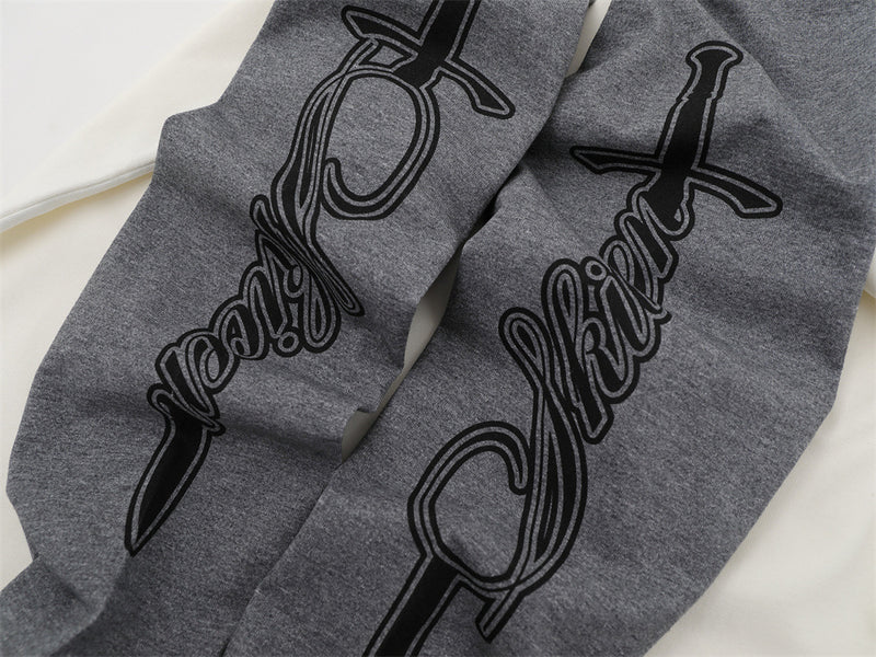 Camiseta de manga larga para hombre con bloques de color y bordado de texto – Corte relajado