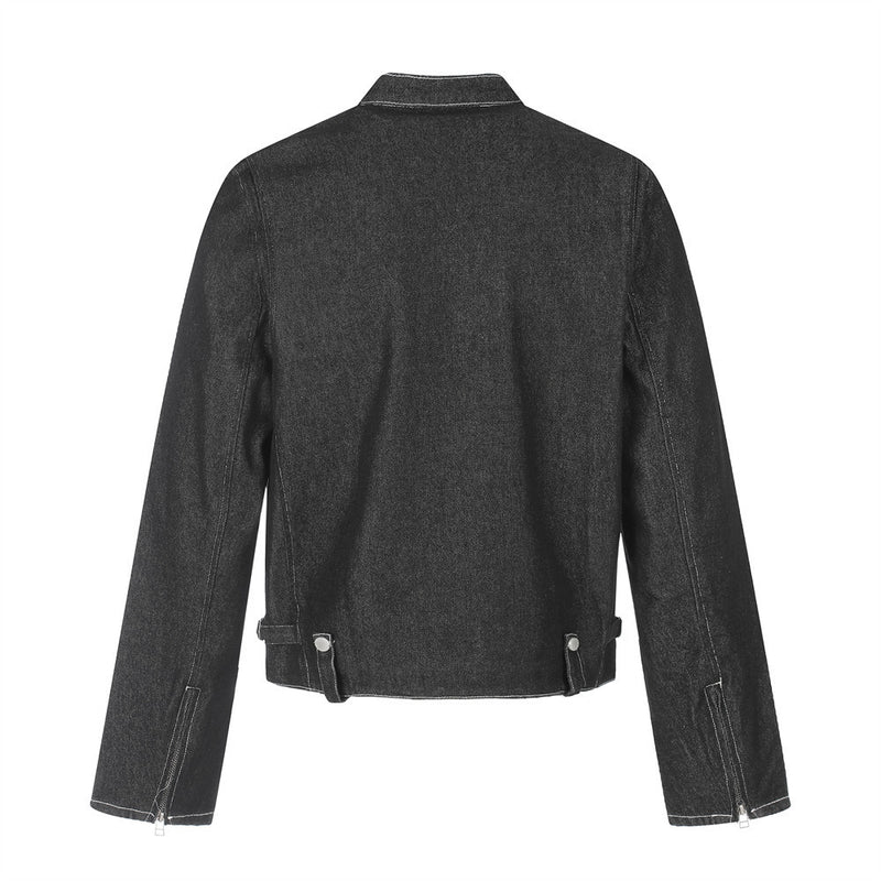 Back view of black cropped denim jacket with plain panel and zip details on sleeves