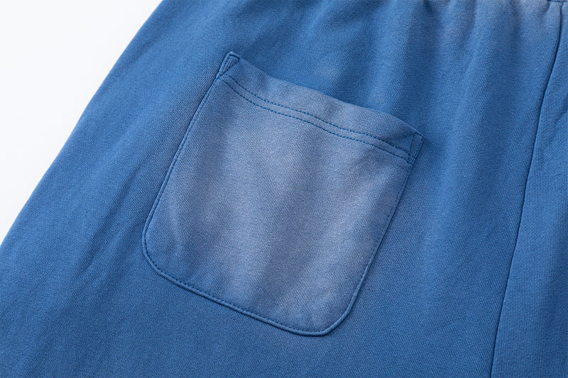 Pantalon de survêtement à jambes larges, imprimé graphique vintage effet acid-wash, coupe décontractée