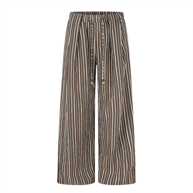Wide-leg vertical stripe pants with elastic drawstring waist and wooden bead cord tips in brown colorway
