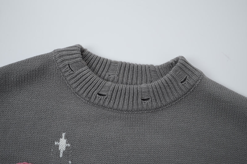 Pull en maille jacquard papillon – Col rond oversize avec broderie rose façon corde