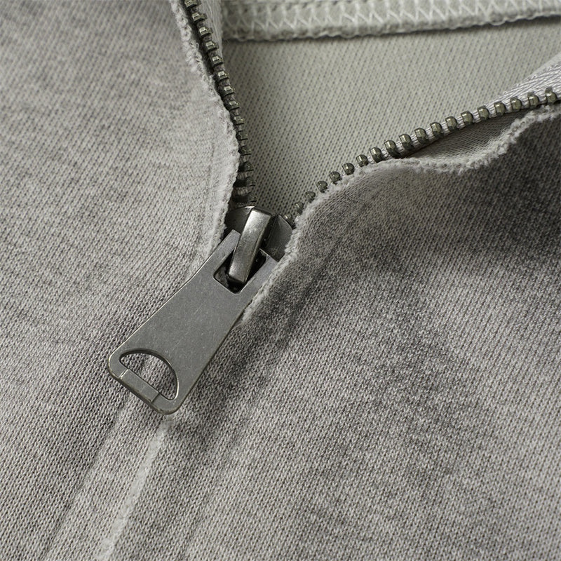 Sweat à capuche oversize zippé – Finition délavée usée, poches à multiples zips et bords bruts