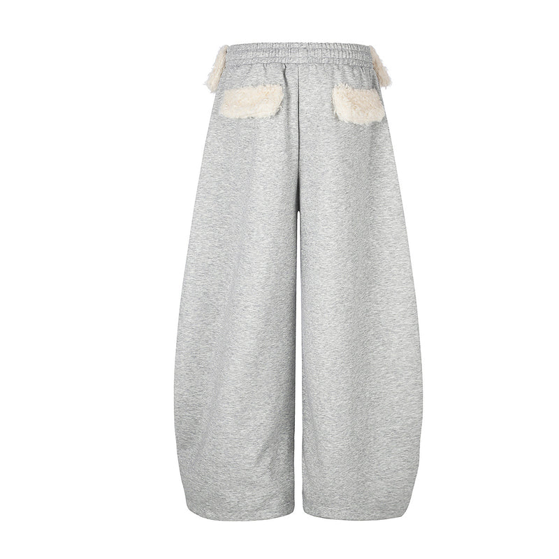 Pantalon de survêtement à jambes larges avec ceinture en sherpa et étoiles brodées
