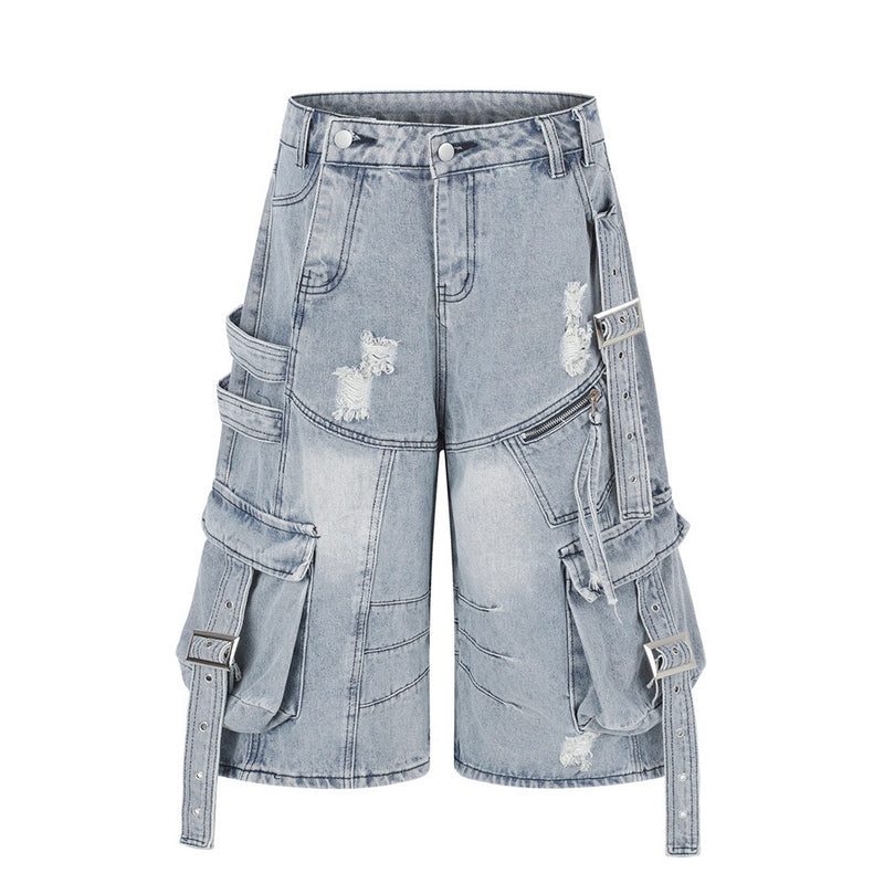Deconstructed punk cargo denim shorts with multi-pocket buckle strap detail in light blue and dark grey wash
