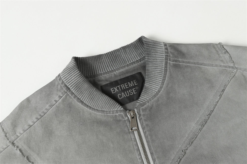 Blouson bomber déconstruit en patchwork – Toile délavée et coutures brutes