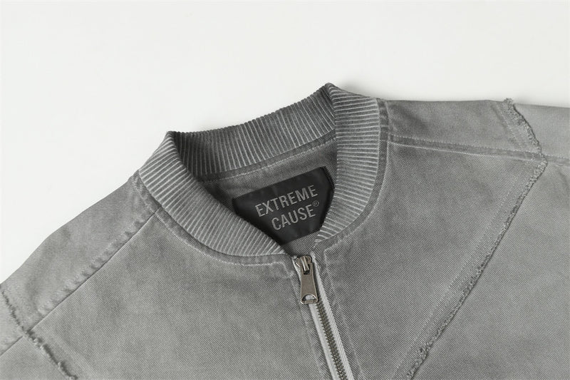 Blouson bomber déconstruit en patchwork – Toile délavée et coutures brutes