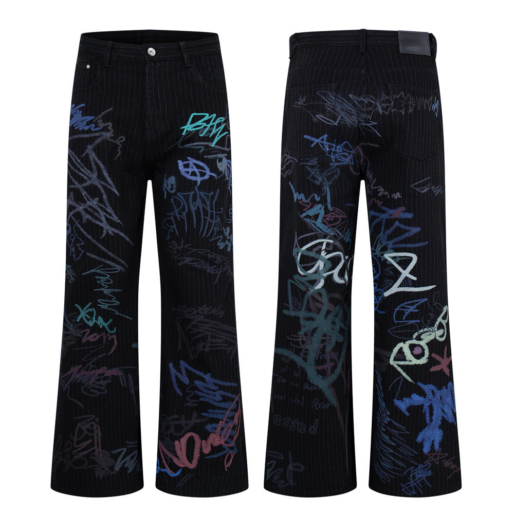 Black pinstripe wide-leg jeans with all-over multicolor graffiti print, shown front and back view