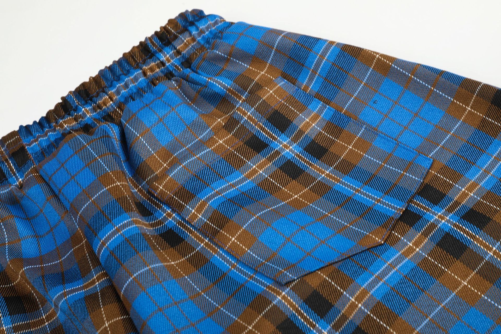 Wide-Leg Plaid Pants – Blue Tartan Baggy Fit with Crest Graphic & Drawstring Hem