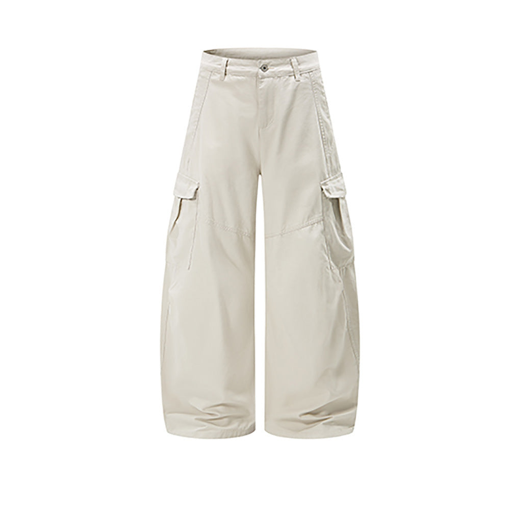 Cream wide-leg cargo pants with side flap pockets, front view