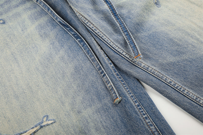 Wide-Leg Distressed Jeans – Gradient Washed Denim with Ripped Details