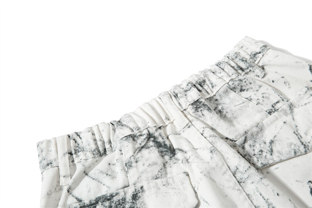 Hose mit weitem, geschwungenem Bein – Ink-Wash-Print, Falten und lockere Baggy-Passform