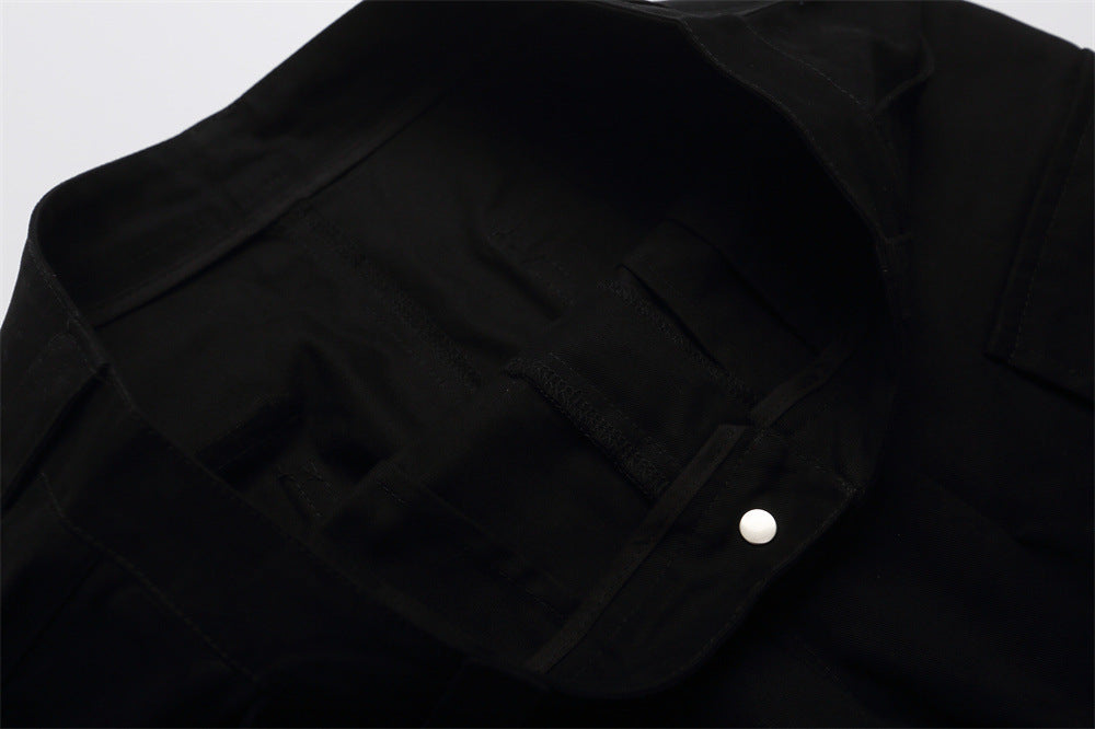Close-up of black shorts waistband and inside pocket opening