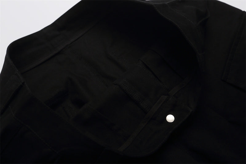 Close-up of black shorts waistband and inside pocket opening