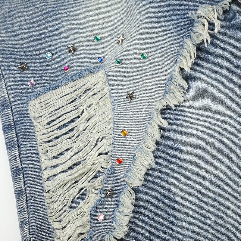Jean large déchiré pour homme avec ornements en strass et étoiles