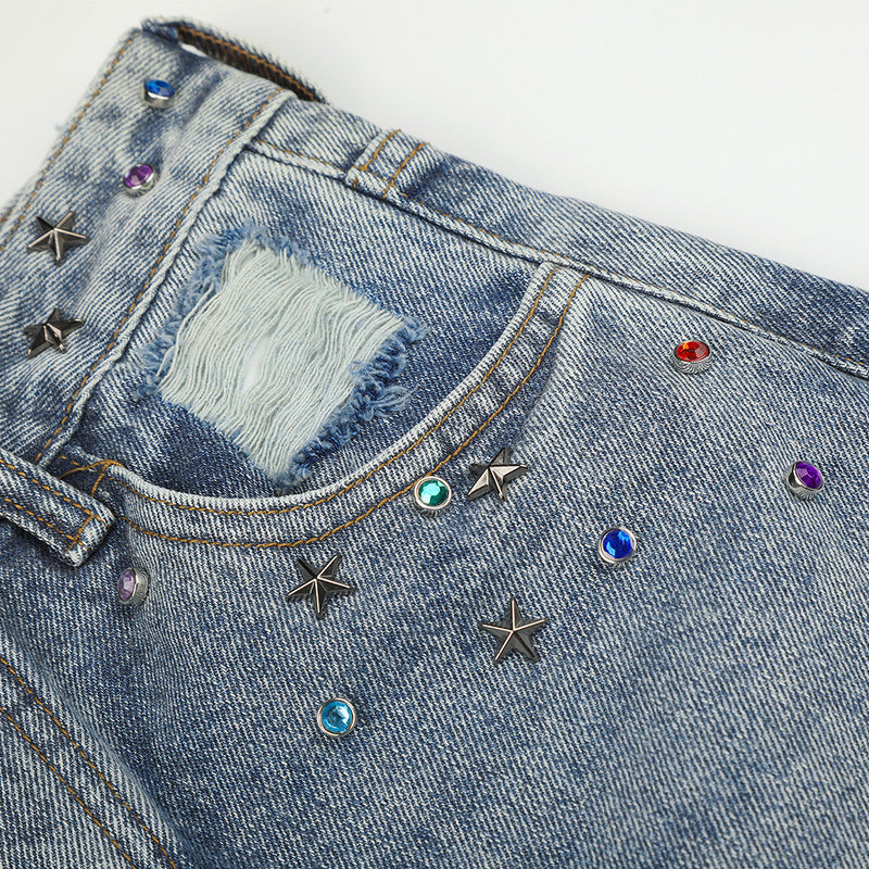Jean large déchiré pour homme avec ornements en strass et étoiles
