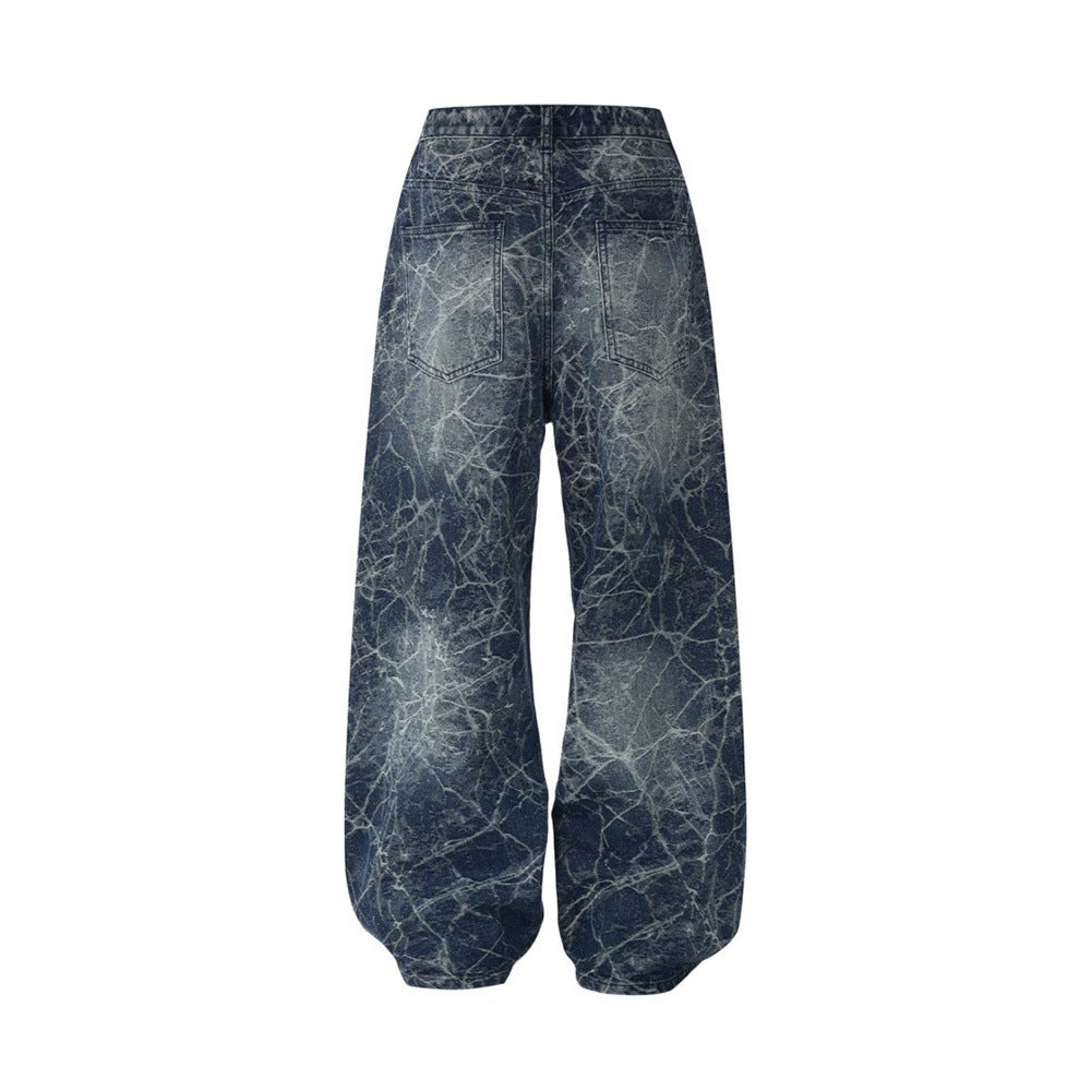 Back view of wide-leg distressed jeans with faded constellation print and back pockets
