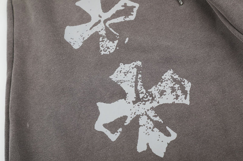 Pantalones de chándal de pierna ancha con cruz estampada y acabado lavado ácido