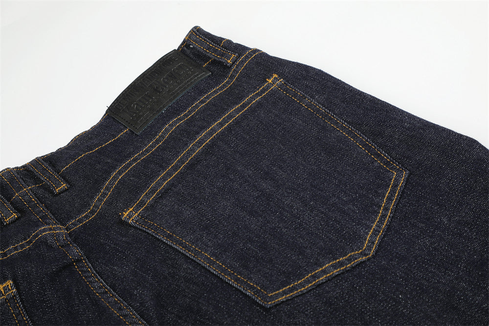 Wide-Leg Flare Jeans with Embossed Pocket Detail – Dark Indigo