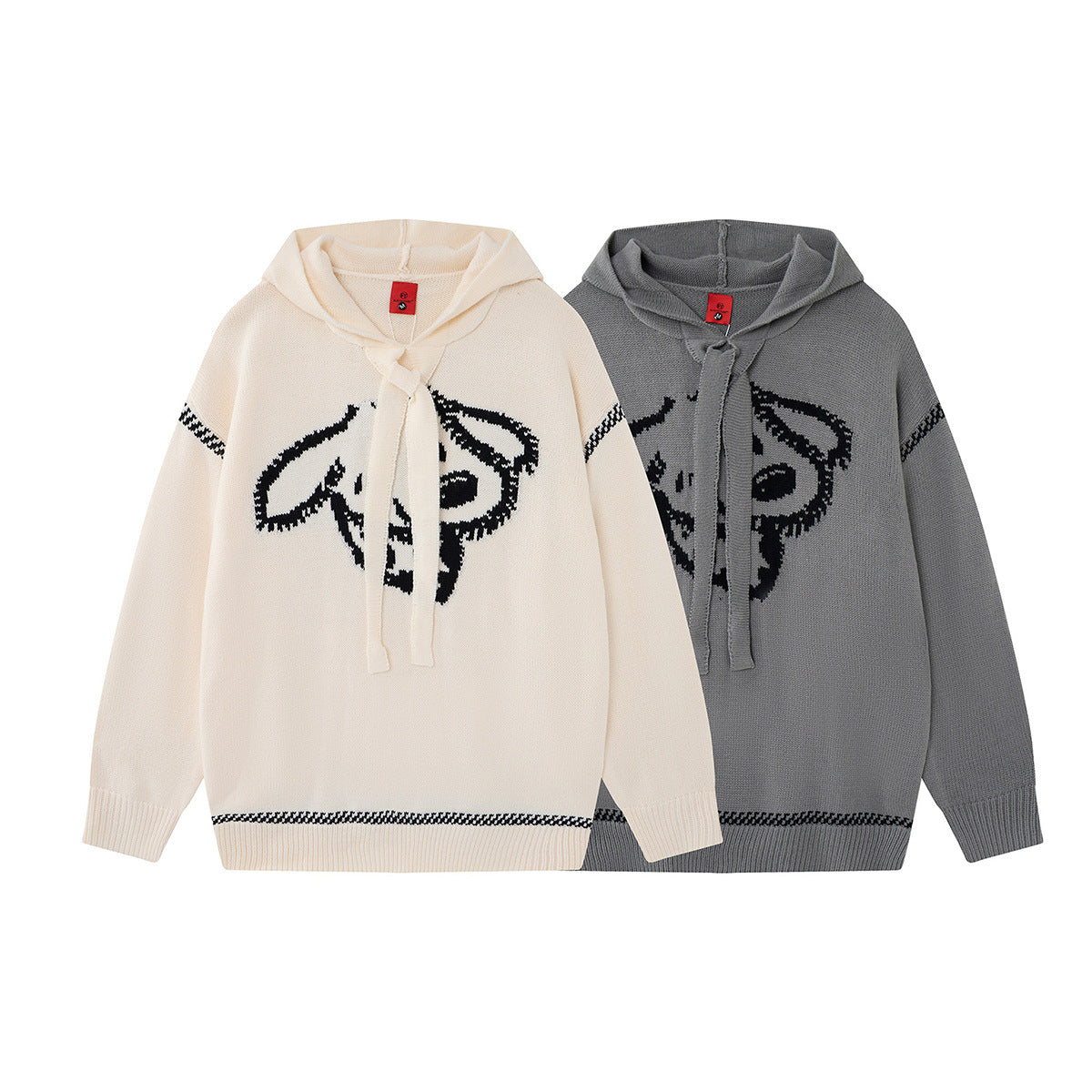 Pull à capuche oversize en maille jacquard avec grand motif graphique sur le devant