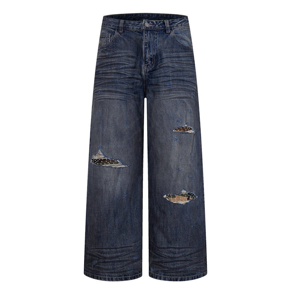 Wide-Leg Ripped Jeans – Vintage Washed Distressed Denim with Studded Patches