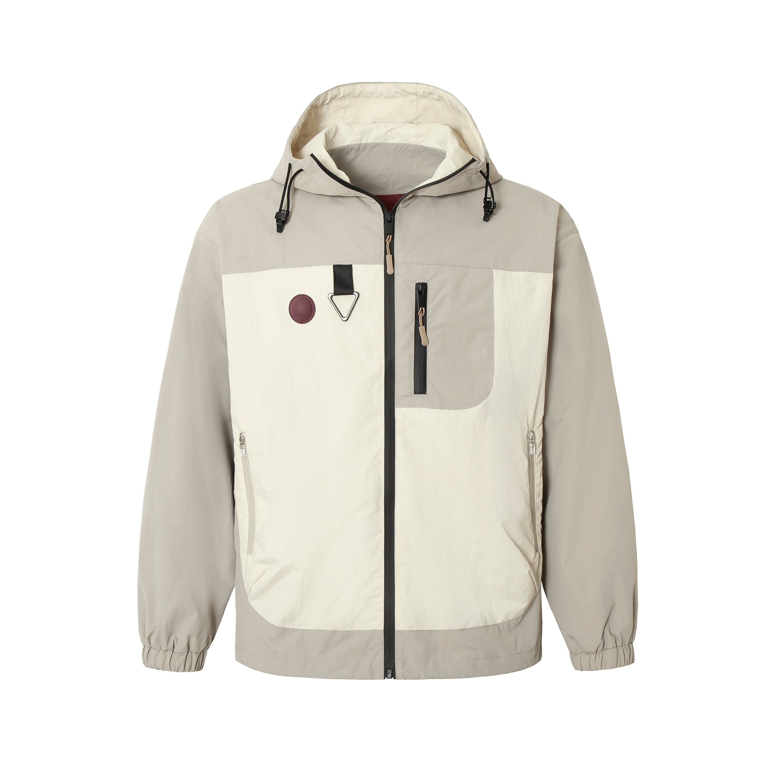 Front view of a two-tone cream and greige hooded nylon windbreaker with zip pockets and colorblock panels
