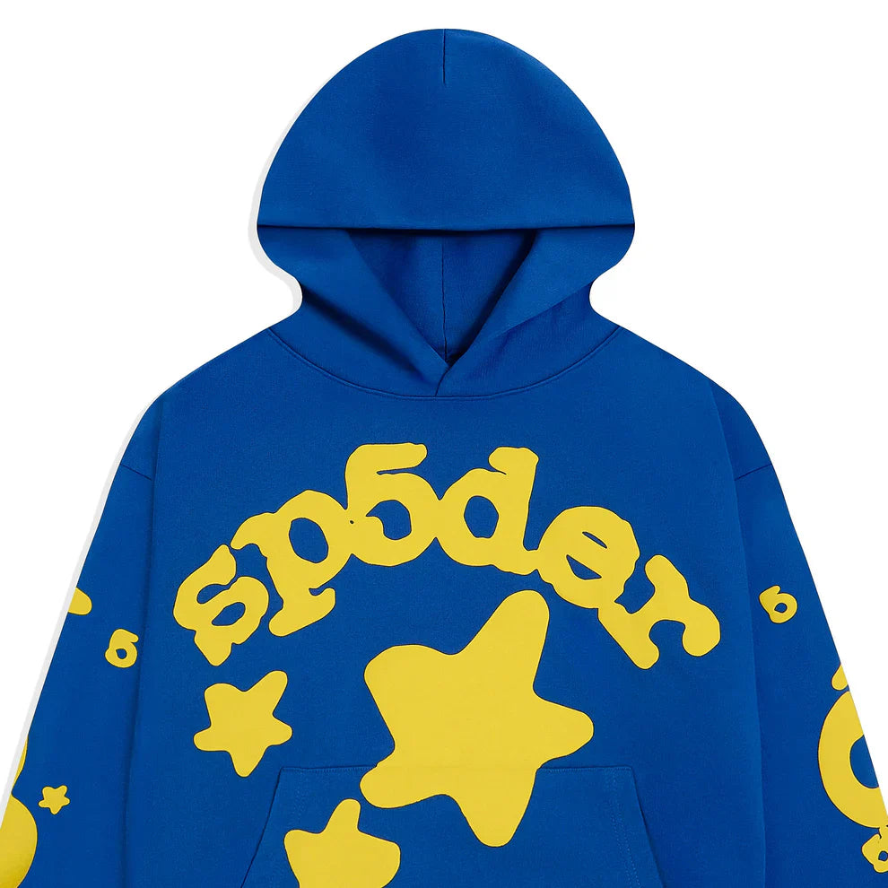 The Sp5der 440GSM Heavyweight Hoodie in royal blue features bold yellow star 3D puff print on the front and sleeves, crafted from heavyweight cotton fleece for an authentic Y2K streetwear look.
