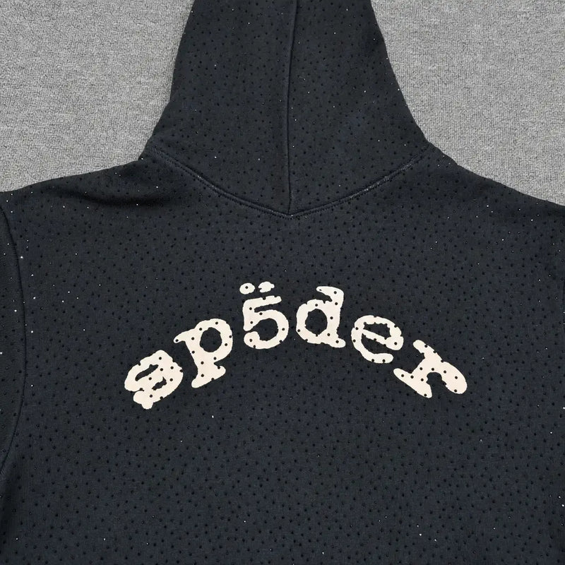 The Sp5der Black Rhinestone Hoodie features a cream arch logo across the back, subtle rhinestone embellishments, small dotted patterns, and is made from cotton—a standout piece in any streetwear collection.