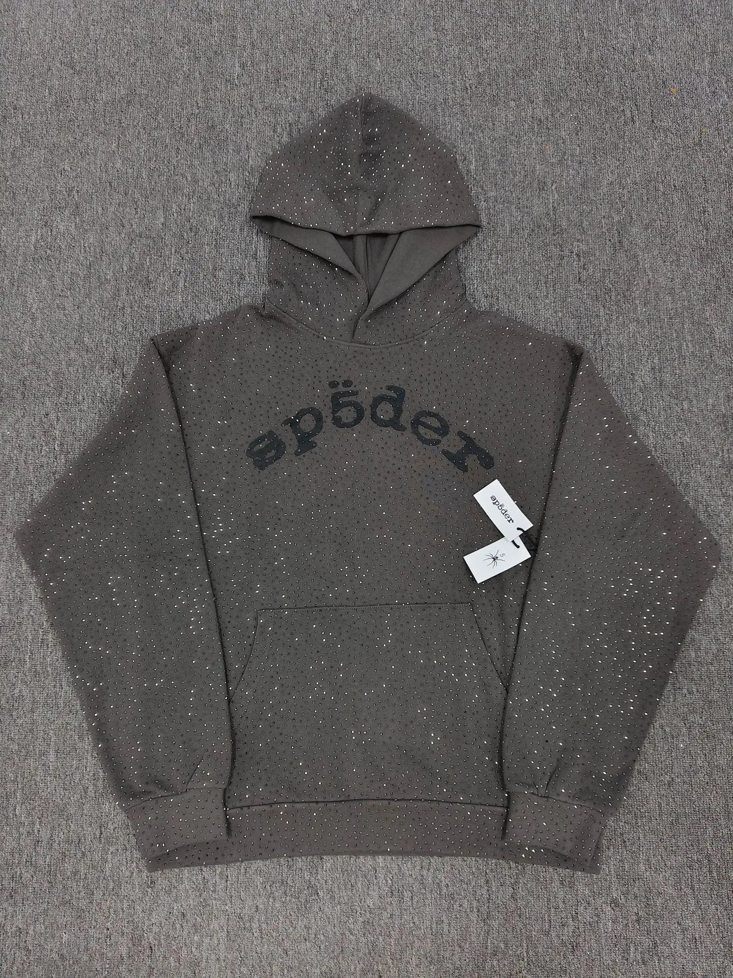 Sp5der dark grey pullover hoodie with all-over rhinestone detailing and black arch logo on the chest