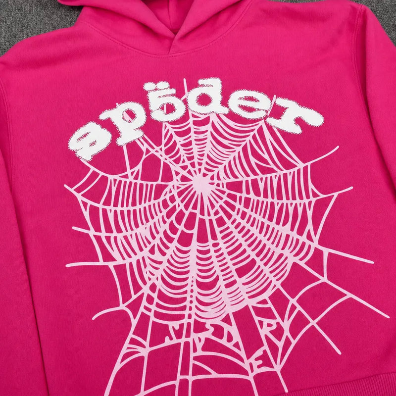 The Sp5der OG Web Hoodie Hot Pink features a bold white spiderweb front print and playful "spider" lettering—a standout, eye-catching piece for any streetwear collection.