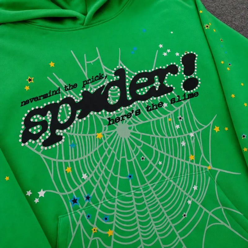 The Sp5der Neon Green Spiderweb Graphic Pullover Hoodie features a white spiderweb design, colorful stars, and bold black "nevermind the pricks, spider! here’s the slime" text—a standout piece for streetwear enthusiasts.