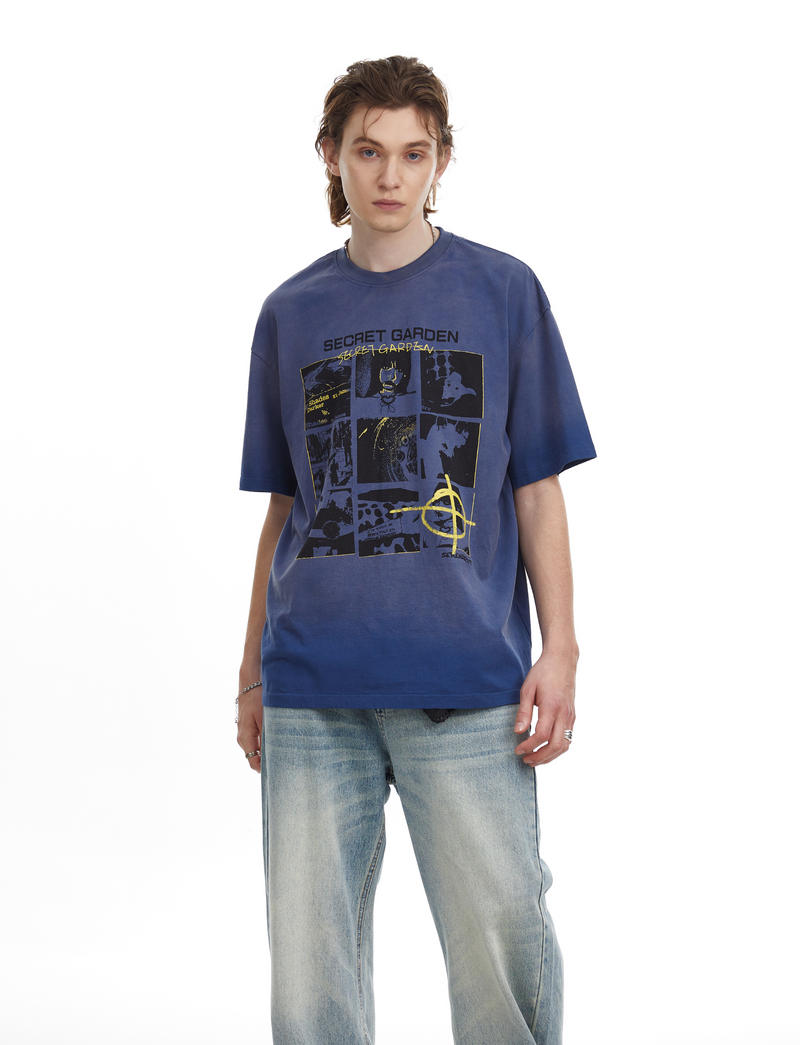 Oversized blue graphic tee with Secret Garden panel print, worn with faded light-wash jeans on a male model