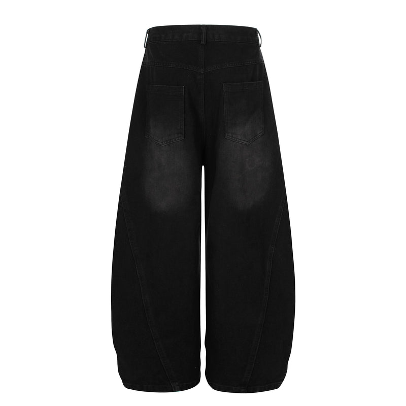 Back view of black wide-leg denim jeans with two back pockets and faded wash