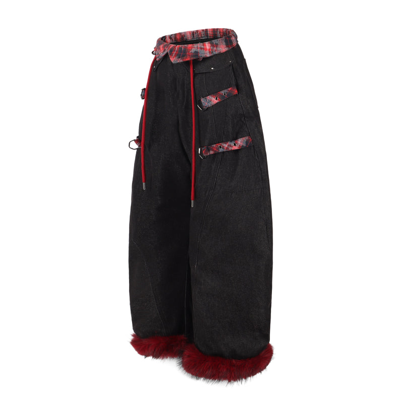 Side view of black barrel leg denim pants with plaid waistband, drawstrings, and faux fur cuffs