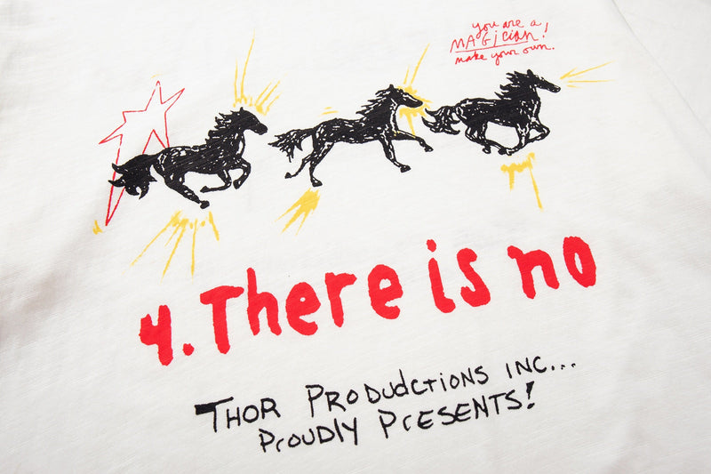 White Number (N)ine graphic T-shirt with black galloping horses and bold red text design on the chest