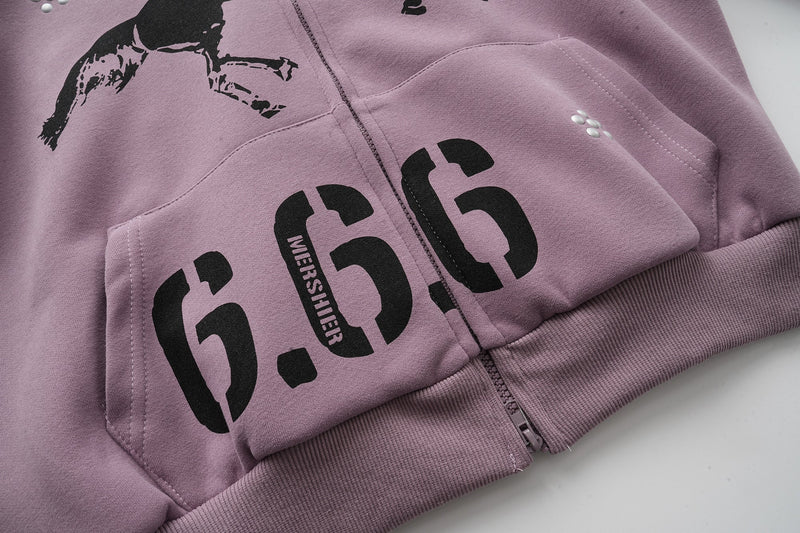 Close-up of lavender hoodie front pocket and 666 print