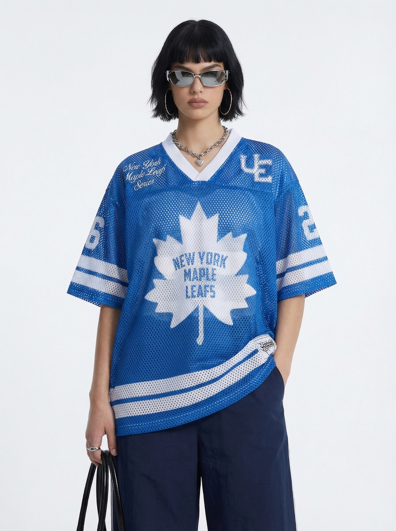 Blue mesh varsity jersey T-shirt with New York Maple Leafs graphic, white stripes, and oversized streetwear fit