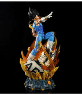 The Seakoff Vegeta Super Saiyan Collectible Figure, a 45cm Dragon Ball Z masterpiece, features interchangeable heads and glowing effects. Posed mid-air with spiky black hair and a blue outfit, it&