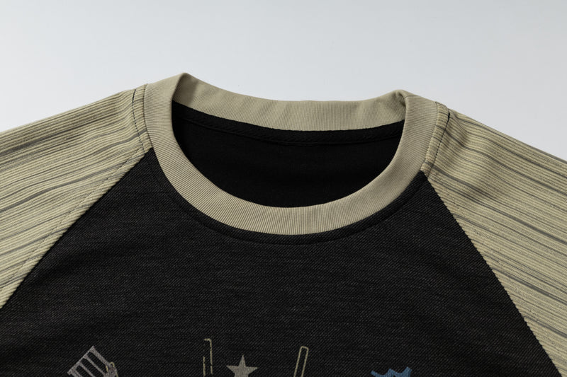 Beige and black raglan T-shirt with ribbed collar and gothic cathedral graphic print on the chest