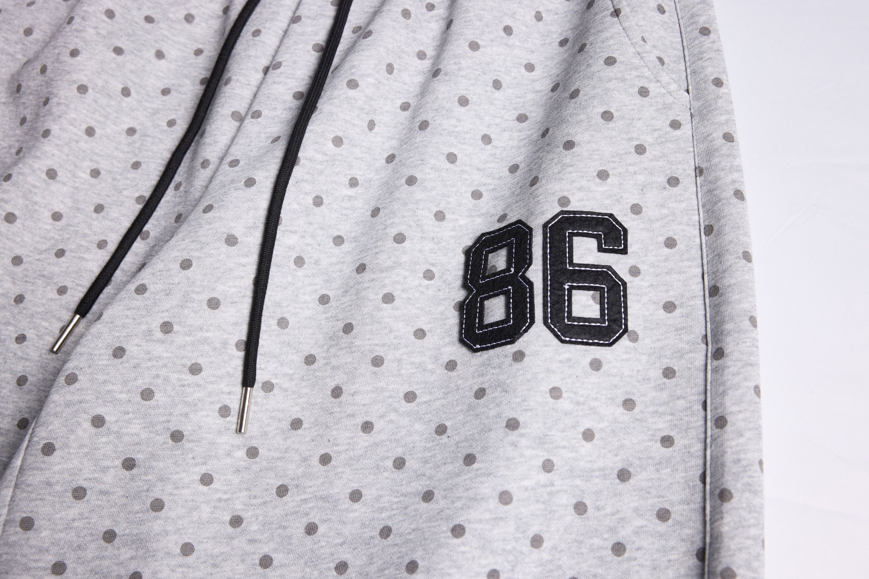 Polka Dot Wide-Leg Sweatpants with Stripe Detail | Omirad