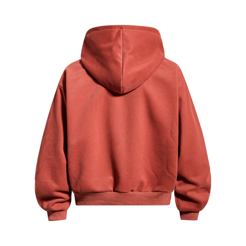 Back view of rust red zip-up hoodie with plain fleece finish and hood
