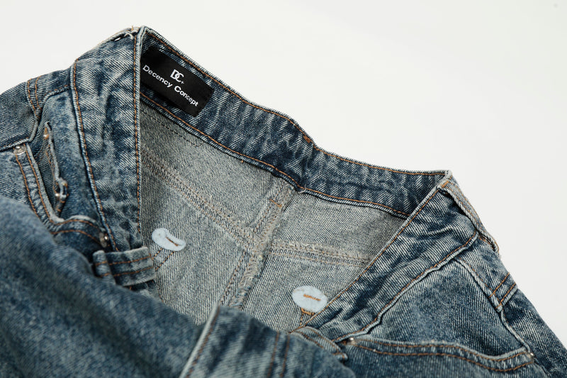 Inside waistband close-up of blue jeans with brand label and light denim lining