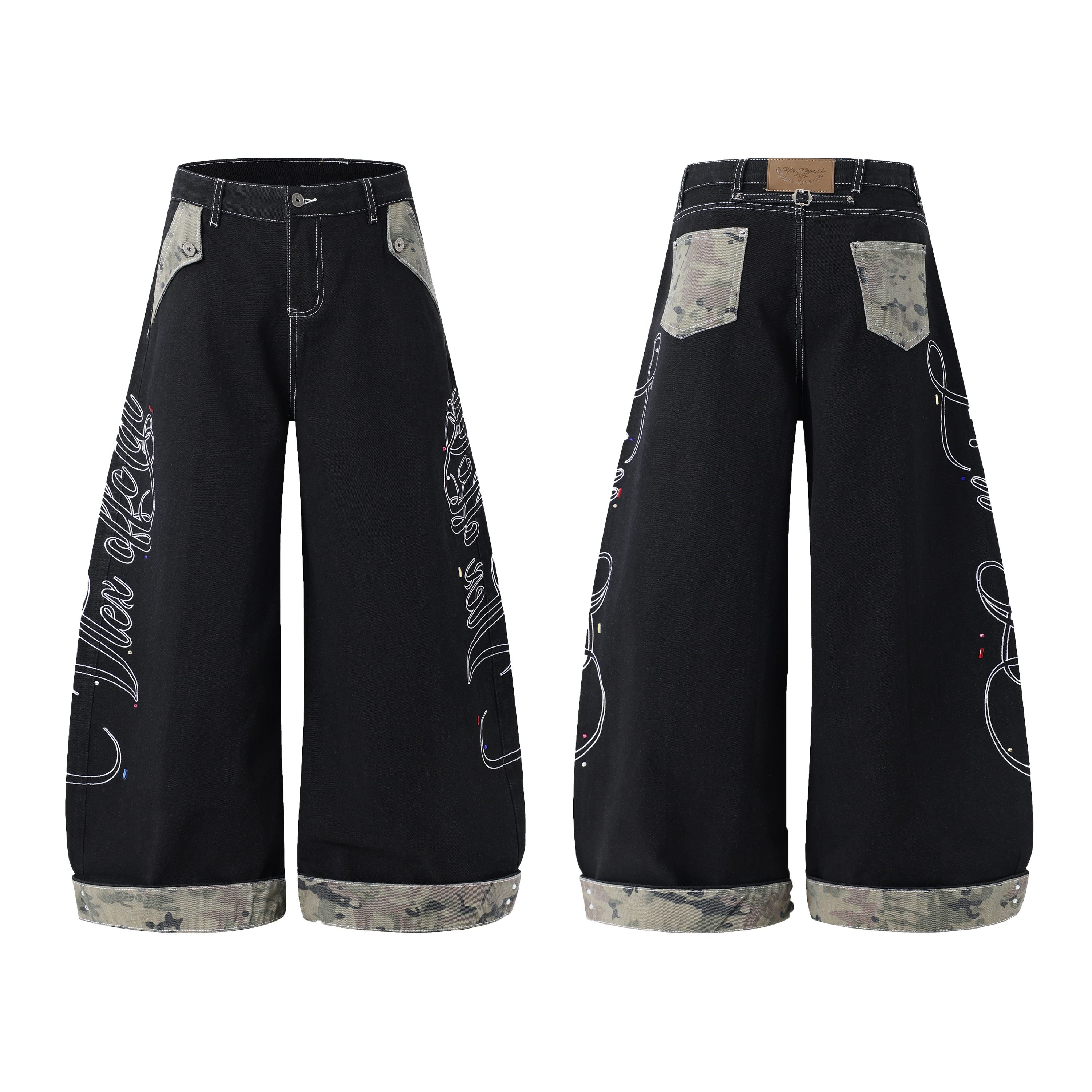 Black wide-leg baggy jeans with camouflage trim pockets, camo cuffed hem, and white script embroidery on both legs, front and